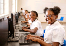 Silicon Valley Girl Foundation To Organize First AI, Productivity, Tech Summit In Ilorin Girls using computers Source: iStock