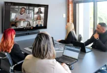 The Proven Guide to Remote Startup Team Management That Actually Works Conferencing with a remote team Image source: AVT visual solutions, South Africa