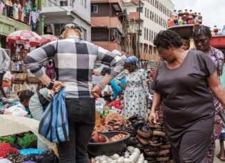 The Price Marketplace: Using AI and Crowdsourced Data to Fight Foodstuff Price Manipulation in Nigeria — An Interview with Mfonobong Uyah The Price Marketplace: A food market in Africa Image credit: Bloomberg.com